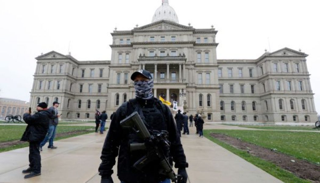 Michigan Lawmaker Flanked By Armed Black Men After Violent Anti-Shutdown Protests