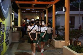 Pupils return to school in Singapore