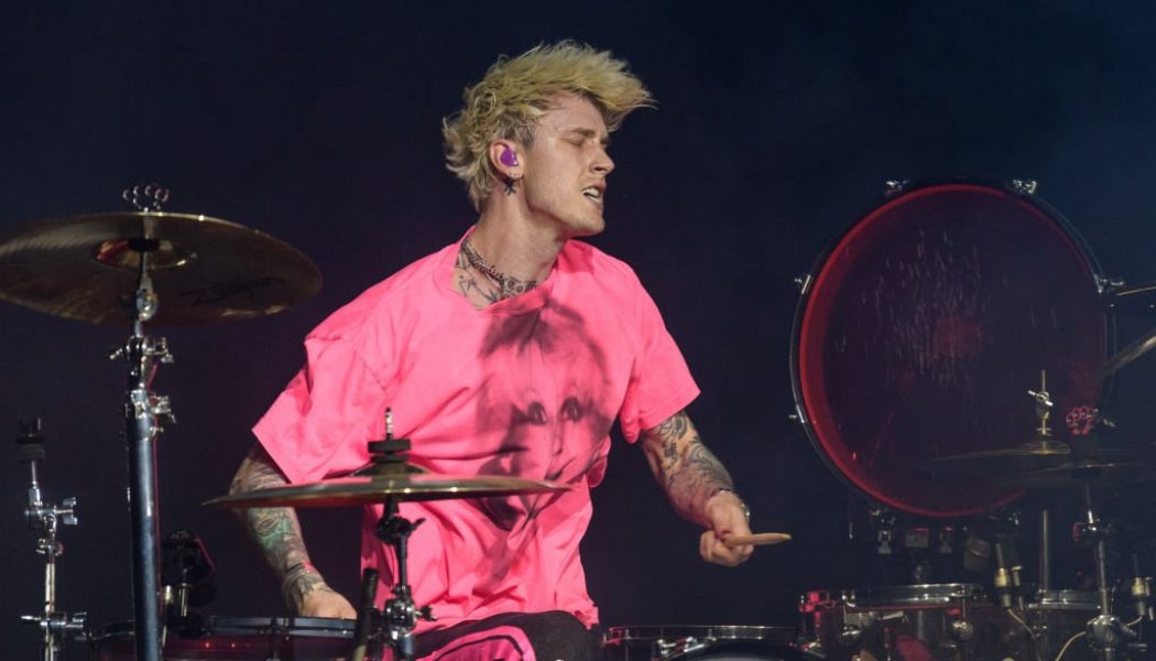 Rapper Machine Gun Kelly Is Blowing Megan Fox’s Back Out, Allegedly