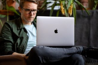 Apple warns customers not to close its laptops with a camera cover attached