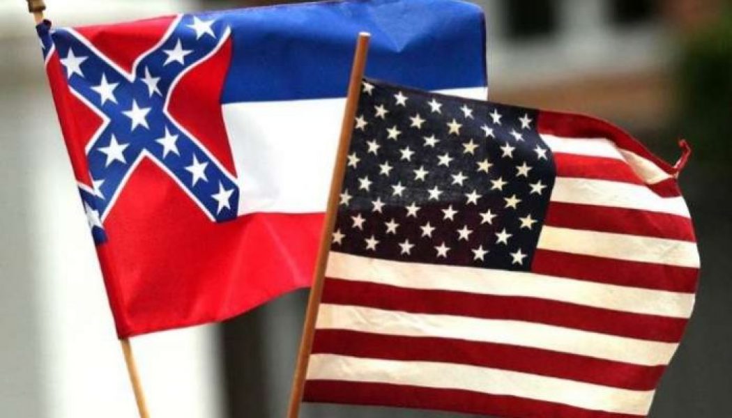 Mississippi governor signs bill removing confederate symbol from flag
