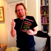 IRON MAIDEN’s ADRIAN SMITH Unboxes First Copy Of His Upcoming Fishing Memoir ‘Monsters Of River & Rock’