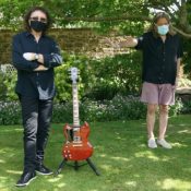 Photo: Masked TONY IOMMI And ROBERT PLANT Autograph Guitar For ‘MusiCares Charity Relief Auction’