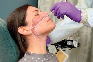 Please remain calm while the robot swabs your nose