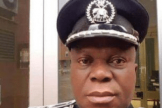 Police parades suspected killer of relatives of ex-minister