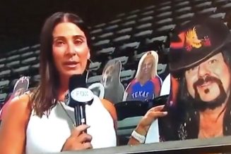 TV Reporter Sings Pantera’s “Walk” Riff While Spotlighting Vinnie Paul Cutout at Texas Rangers Game