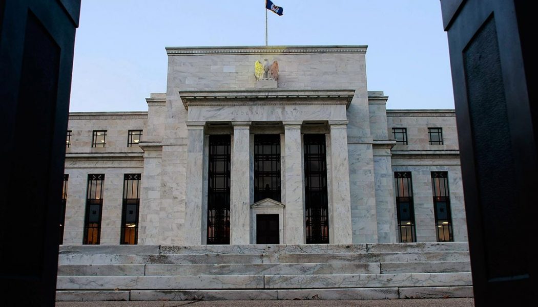 Fed expects to keep rates near zero through 2023