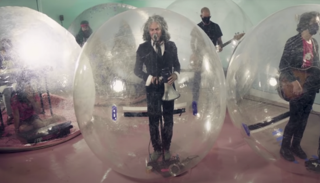 The Flaming Lips Perform ‘God and the Policeman’ From Their Trademark Space Bubbles For Fallon