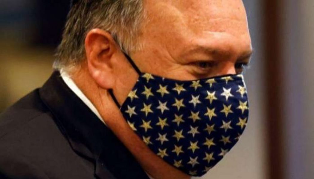 US eases China travel warning, citing virus progress