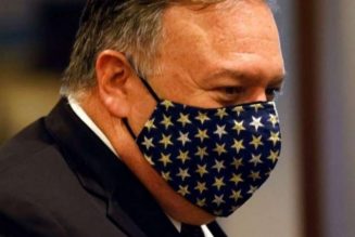 US eases China travel warning, citing virus progress