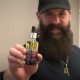 DREAM THEATER’s JOHN PETRUCCI Unboxes His Signature Range Of Specialty Beard And Mustache Products (Video)