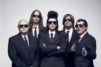 Puscifer Are Suited Up in ‘Fake Affront’ Video