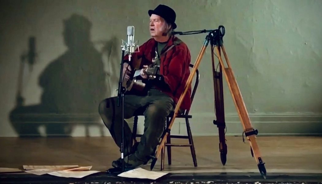Neil Young Returns to His Hometown to Play “Comes a Time” in an Empty Theater: Watch