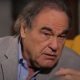 Oliver Stone Received Russia’s Controversial COVID-19 Vaccine, Is “Hopeful” It Will Work
