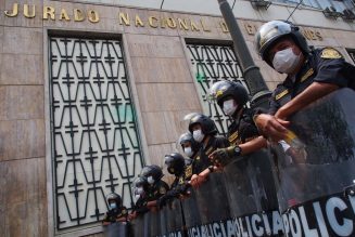 Undercover Cheer: Peruvian Cops Dress As Santa & Elf To Take Down Drug Ring