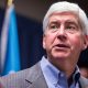 Former Michigan Gov. Snyder charged in Flint water crisis