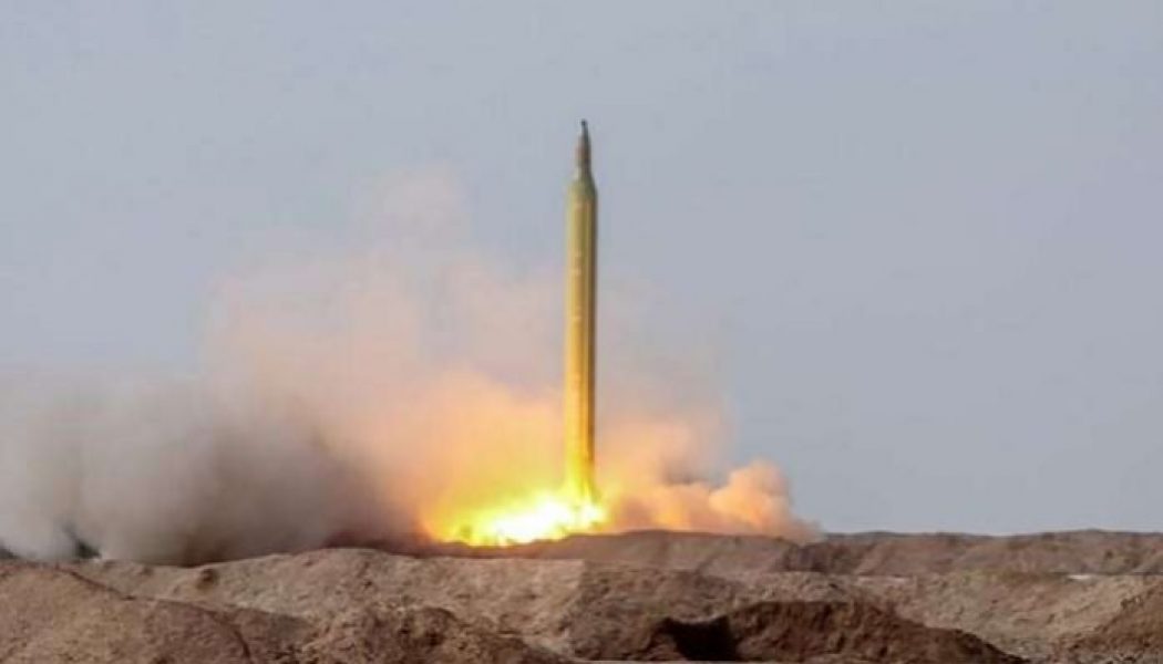 Iran test-fires ballistic missiles on targets at sea