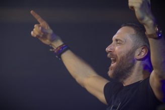 Watch David Guetta Shower the Louvre in Lights in Breathtaking NYE Charity Performance