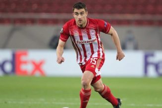 Sokratis reacts after Olympiacos are drawn with Arsenal in the Europa League last 16