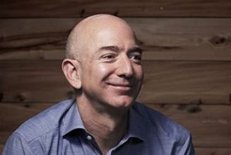 Bezos says Amazon workers aren’t treated like robots, unveils robotic plan to keep them working