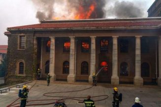 Cape Town fire ‘contained’ as firefighters battle windy conditions