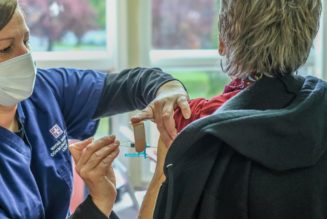 Vaccinated people can ditch masks and social distancing in most places, CDC says