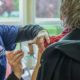 Vaccinated people can ditch masks and social distancing in most places, CDC says