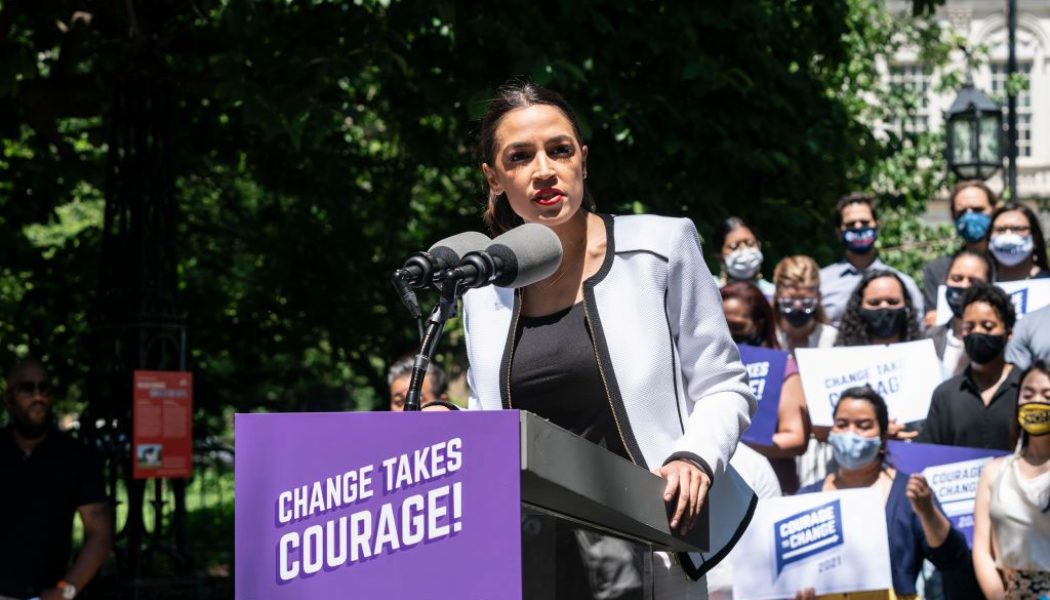 AOC Calls Out Sen. Joe Manchin For Possibly Collecting “Dark Money” From Koch Brothers