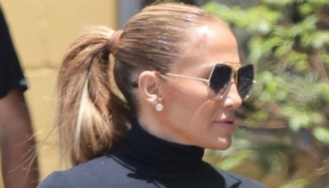 J.Lo Wore an Oversized Button-Down As a Dress With This 2000s Shoe Trend