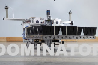 Robot arranges 100,000 dominoes into a Super Mario Bros. mural in one day