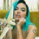 Watch Karol G Get Inked With Friends in ‘200 Copas’ Video