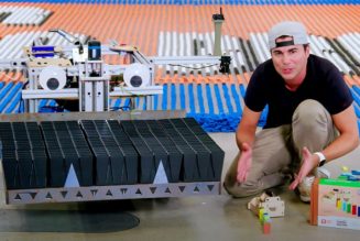 Watch This Robot Build a 100,000-Domino ‘Super Mario Bros’ Mural in a Day