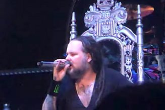 Korn’s Jonathan Davis “Struggling with COVID After-Effects,” Sits on Throne While Performing