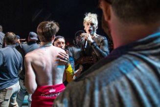 Machine Gun Kelly Fights Fan, Gets Booed During Louder Than Life Performance: Watch