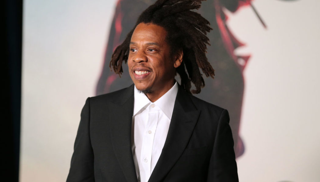 JAY-Z & Kelly Rowland’s Embrace At ‘The Harder They Fall’ L.A. Premiere Lands On Meme Calendar