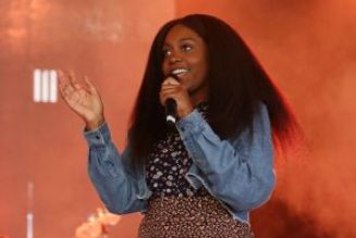 Strong Salute: Noname & Comrades Opens Radical Hood Library