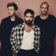 Foals Return with “Wake Me Up” and Tease New Album: “It’s Back to a Sweaty, Late-Night Dance Floor”