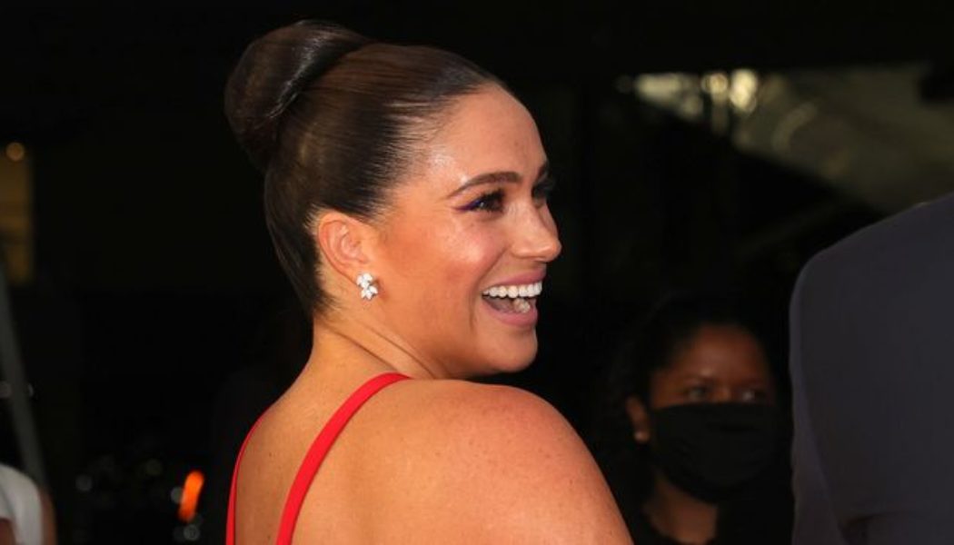 Meghan Markle Just Wore a Plunging Gown With a Thigh-High Slit on the Red Carpet