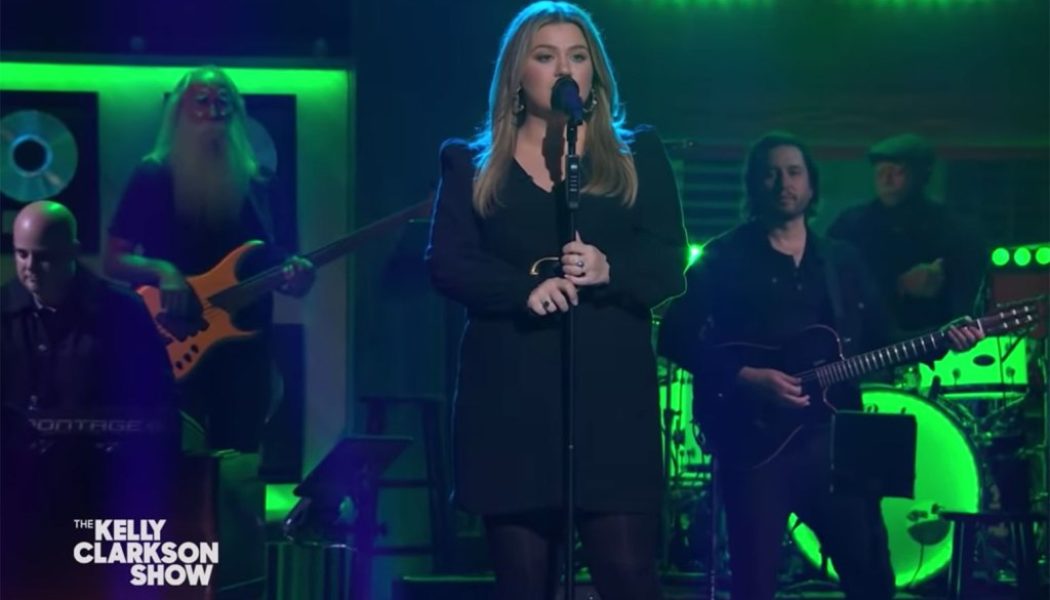 Kelly Clarkson’s Covers Phil Collins’ Socially Conscious Ballad ‘Another Day in Paradise’