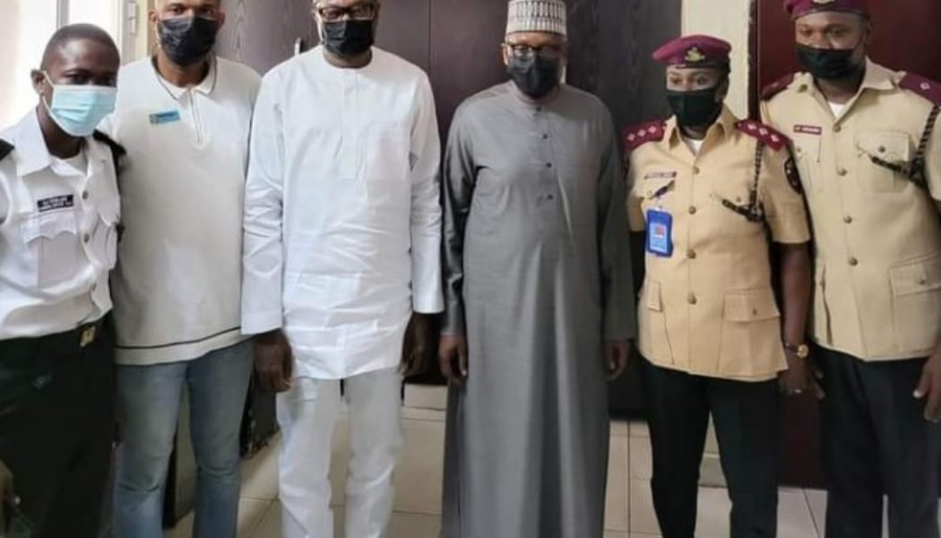 Photo: Otedola Escorts Dangote To Renew Driver’s License In Lagos