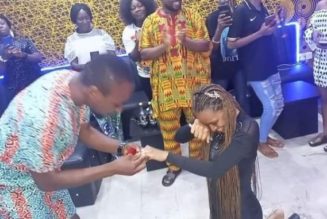 PHOTOS: Newly-engaged Couple Trends As Lady Kneels To Accept Ring