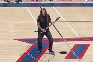 Former MACHINE HEAD Guitarist PHIL DEMMEL Plays U.S. National Anthem At DUBLIN GAELS Basketball Game (Video)