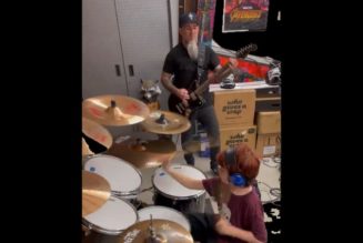 Watch ANTHRAX’s SCOTT IAN Play KORN’s ‘Here To Stay’ With His 10-Year-Old Son