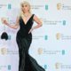 Lady Gaga’s Dramatic Green Velvet Gown Is Expertly Sculpted to the Star’s Body