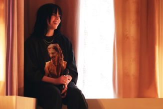 Watch Billie Eilish, in Taylor Hawkins Shirt, Perform “Happier Than Ever” at Grammys 2022