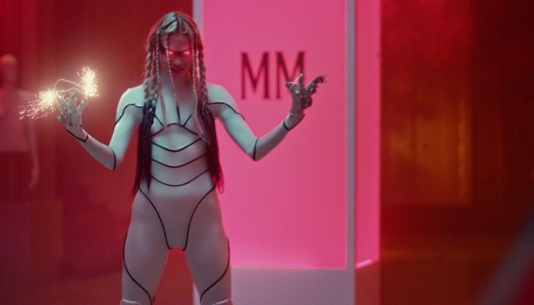 Grimes Stars in Bella Poarch’s Video for New Song “Dolls”