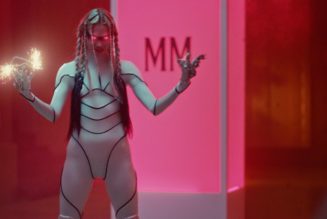 Grimes Stars in Bella Poarch’s Video for New Song “Dolls”