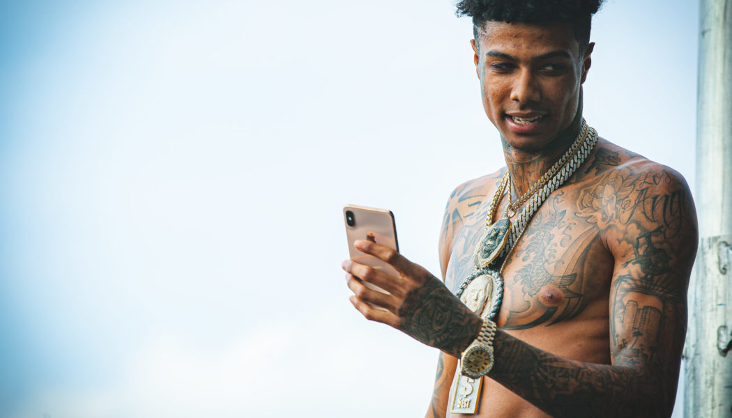 Blueface & His Formally Toothless Boo Duke It Out In The Streets of Hollywood