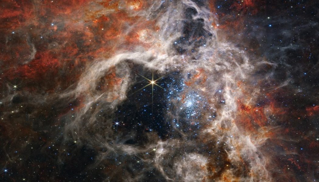 NASA Shares Dazzling Images of a Cosmic “Space Tarantula”