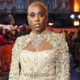 Lashana Lynch Glistens in a Gold Sequinned Cape at “The Woman King” Premiere